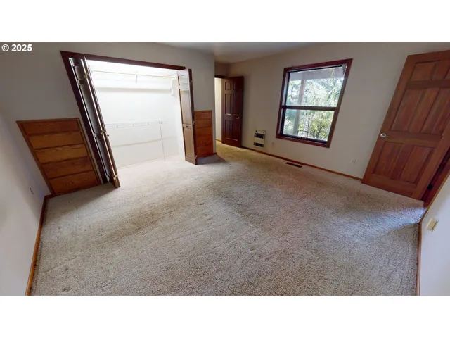 a kitchen with furniture and a table