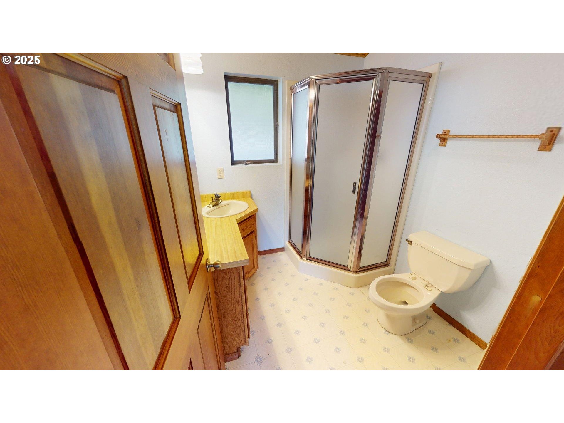 95107 Welsh Drive Gold Beach, OR 97444 - Photo 33 of 48 a bathroom with sink a mirror and a toilet