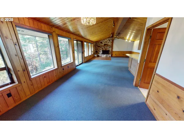 a view of a backyard of the house