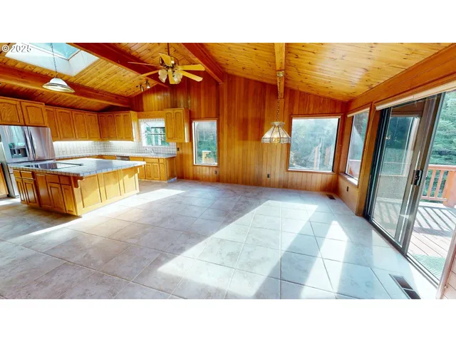 a bathroom with a tub and shower