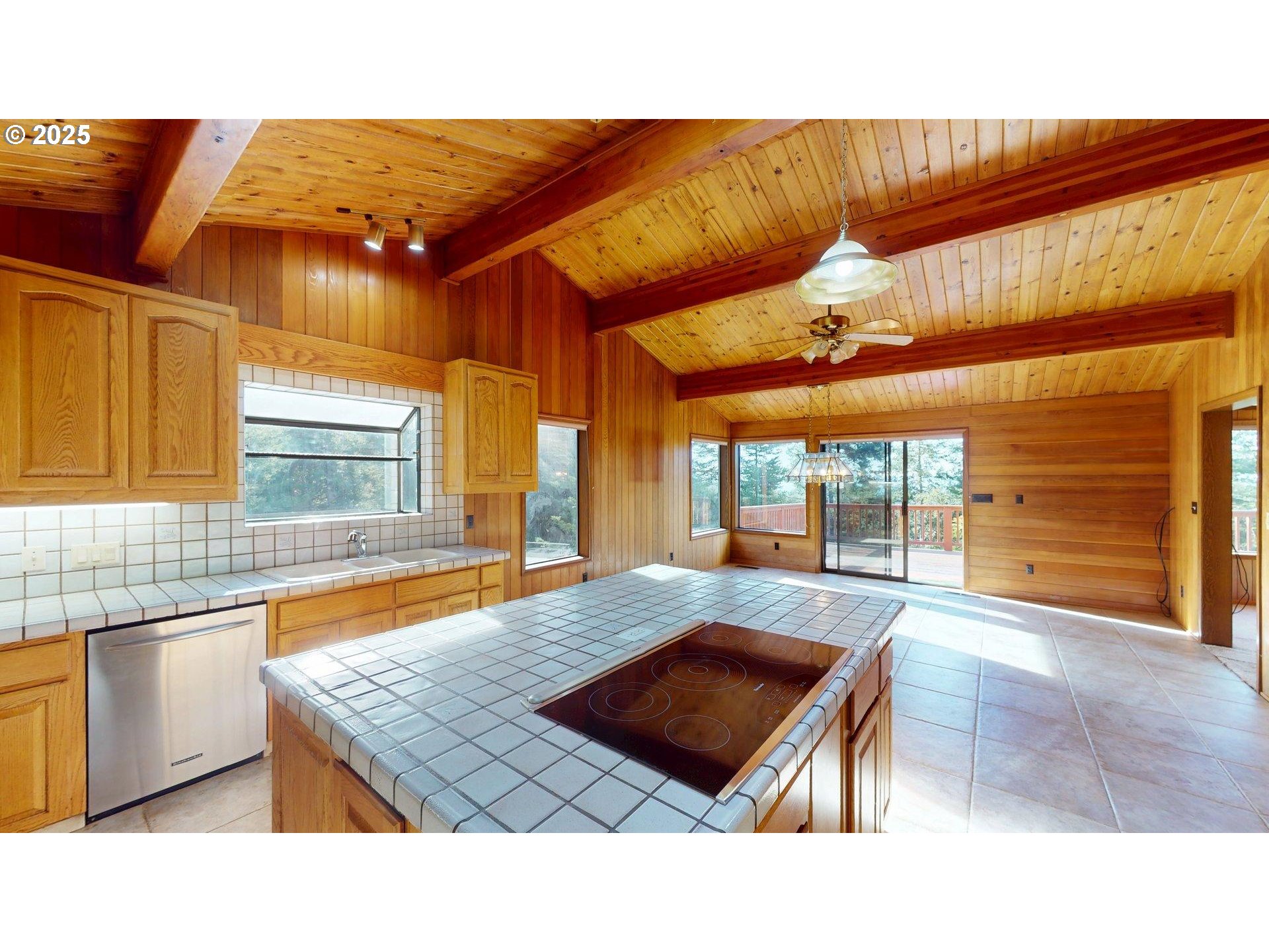 95107 Welsh Drive Gold Beach, OR 97444 - Photo 10 of 48 a room with pool table and windows