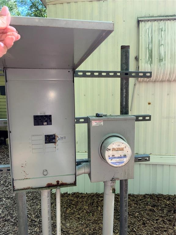 24533 Pink Panther Road Paisley, FL 32767 - Photo 25 of 29 a bathroom with a toilet and a sink