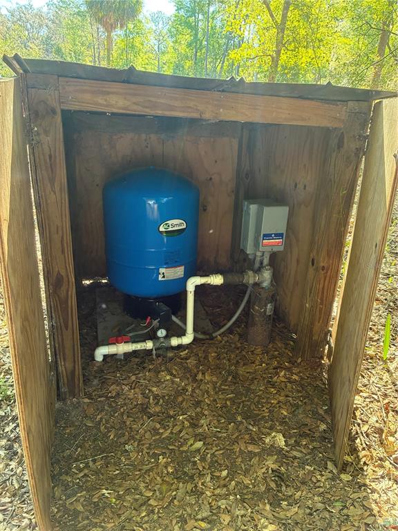 24533 Pink Panther Road Paisley, FL 32767 - Photo 7 of 29 a bathroom with a sink and mirror