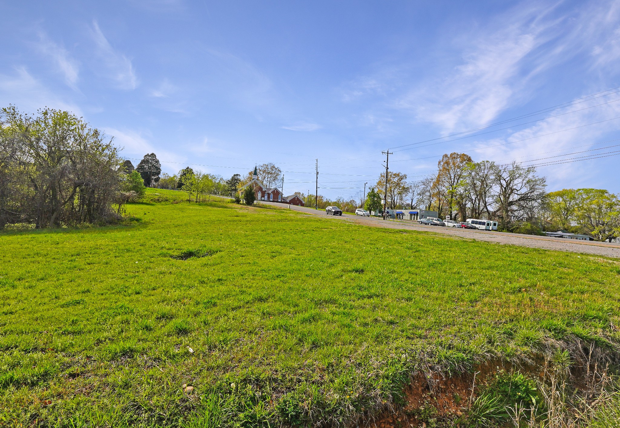 1 Church Street Dover, TN 37058 - Photo 3 of 11 a view of a field with a tree in the background