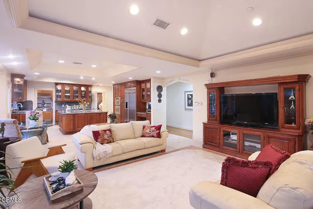 a kitchen with granite countertop a stove and a sink