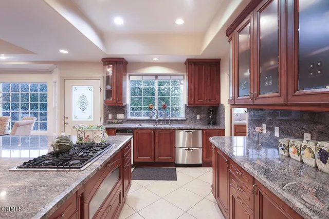 a living room with furniture and a walk in closet
