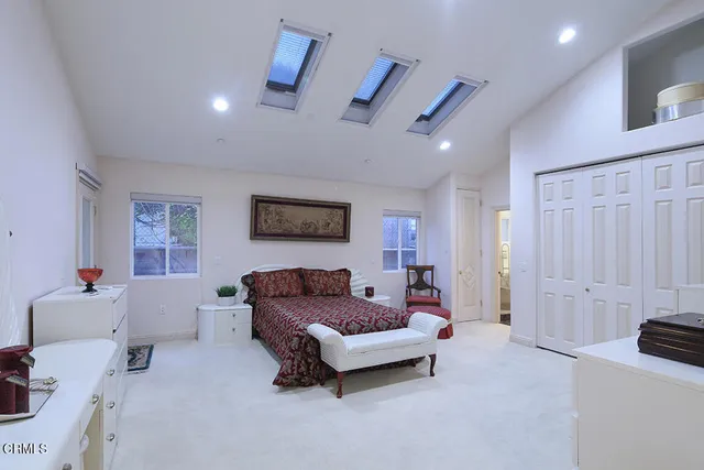 a view of a workspace with furniture