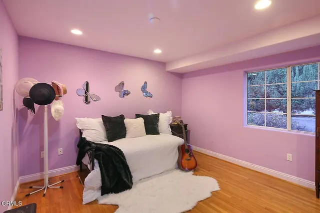 a view of a swimming pool with a sitting area