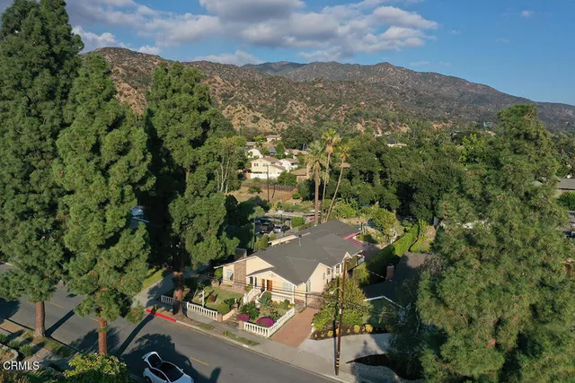 a view of a chairs and table in the patio