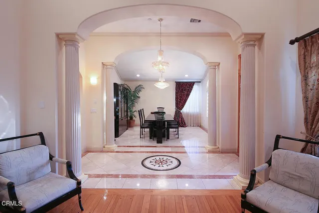 a view of a dining room with furniture window and wooden floor