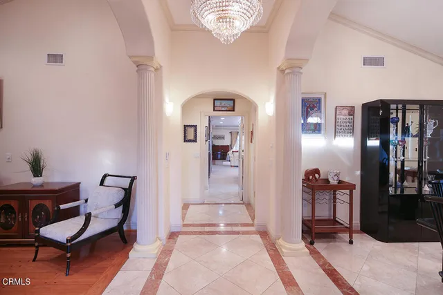 a bathroom with a sink mirror toilet and shower