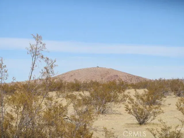 a view of mountain view with mountains in the background