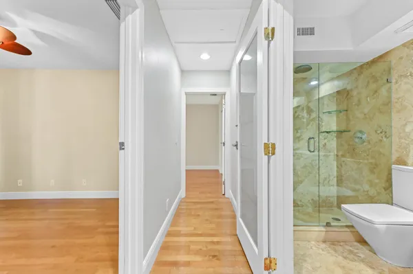 a view of a bathroom from the hallway