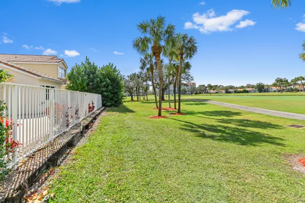 a view of a golf course with a garden