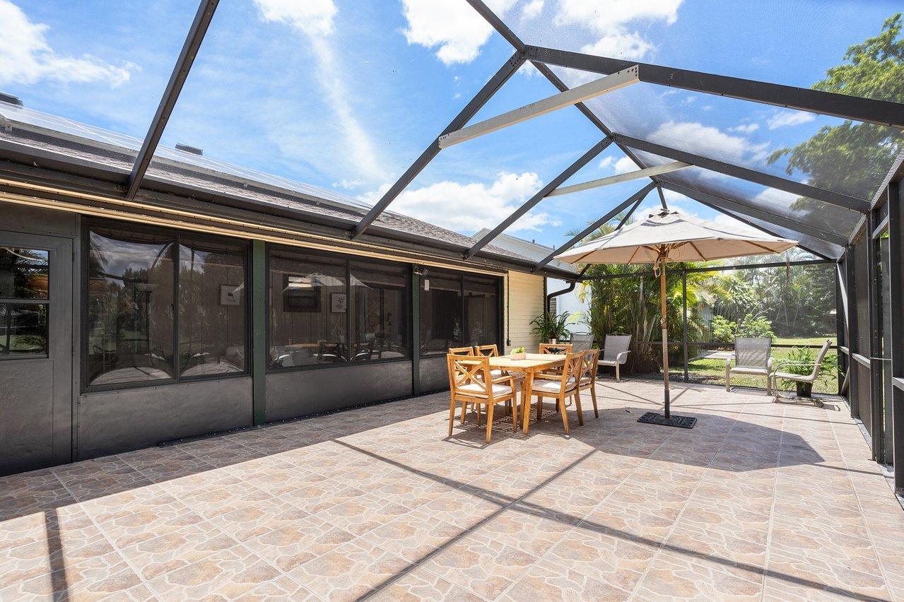 1369 Riverside Circle Wellington, FL 33414 - Photo 26 of 47 Screened patio