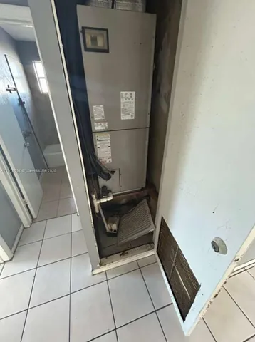 a bathroom with a sink and glass door