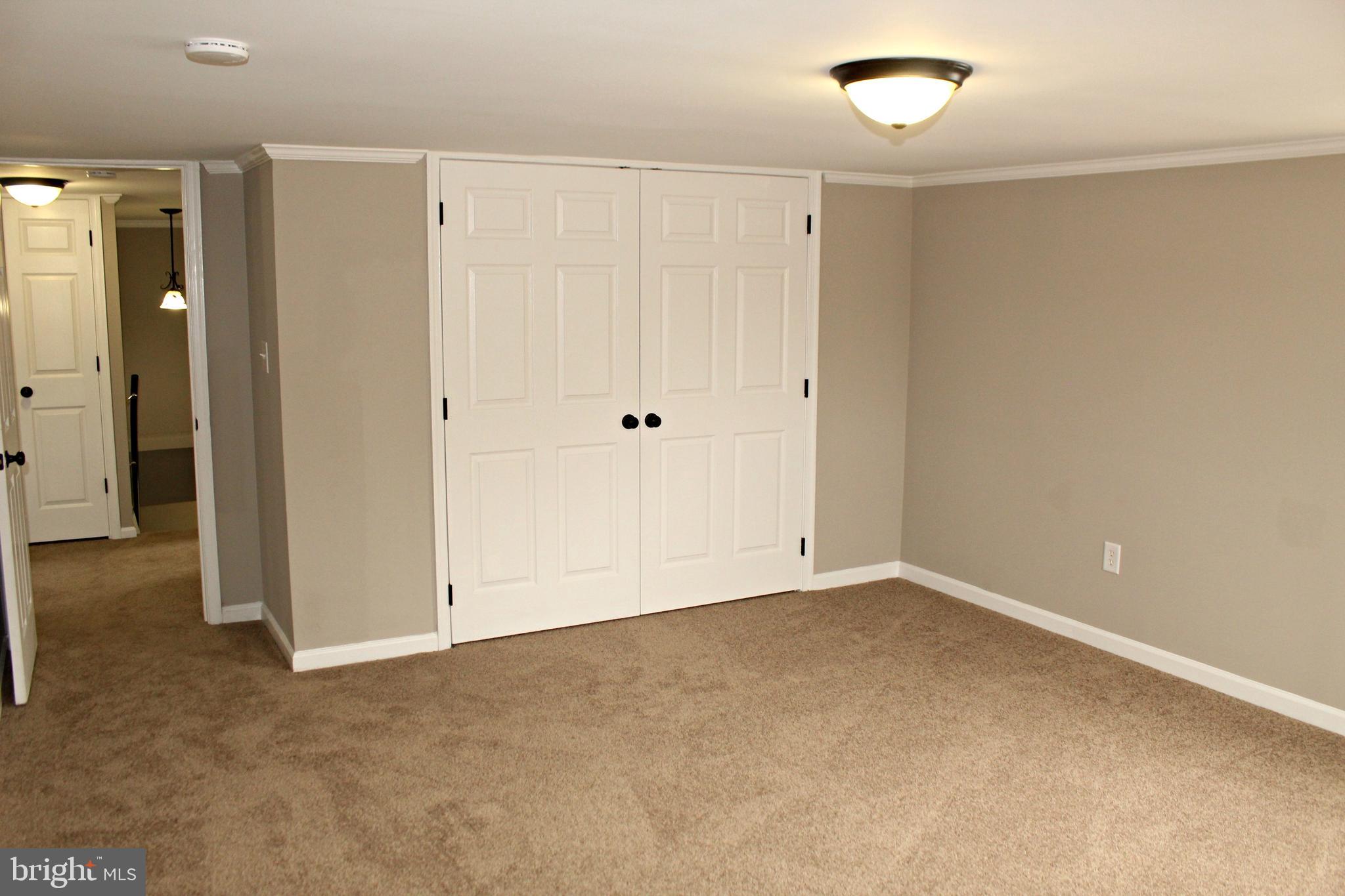 545 Compass Road East Baltimore, MD 21220 - Photo 20 of 30 an empty room with closet area