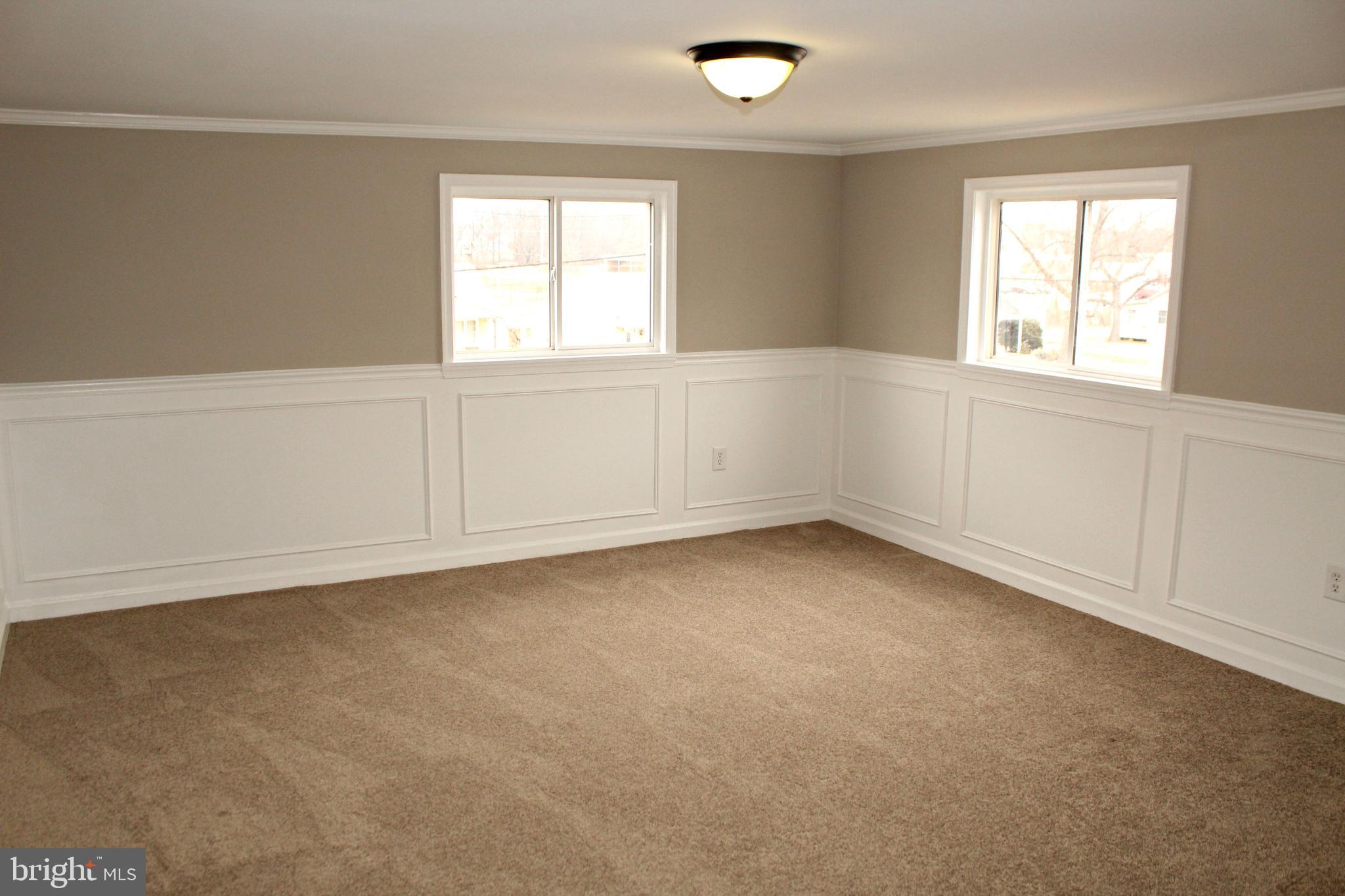 545 Compass Road East Baltimore, MD 21220 - Photo 21 of 30 an empty room with windows