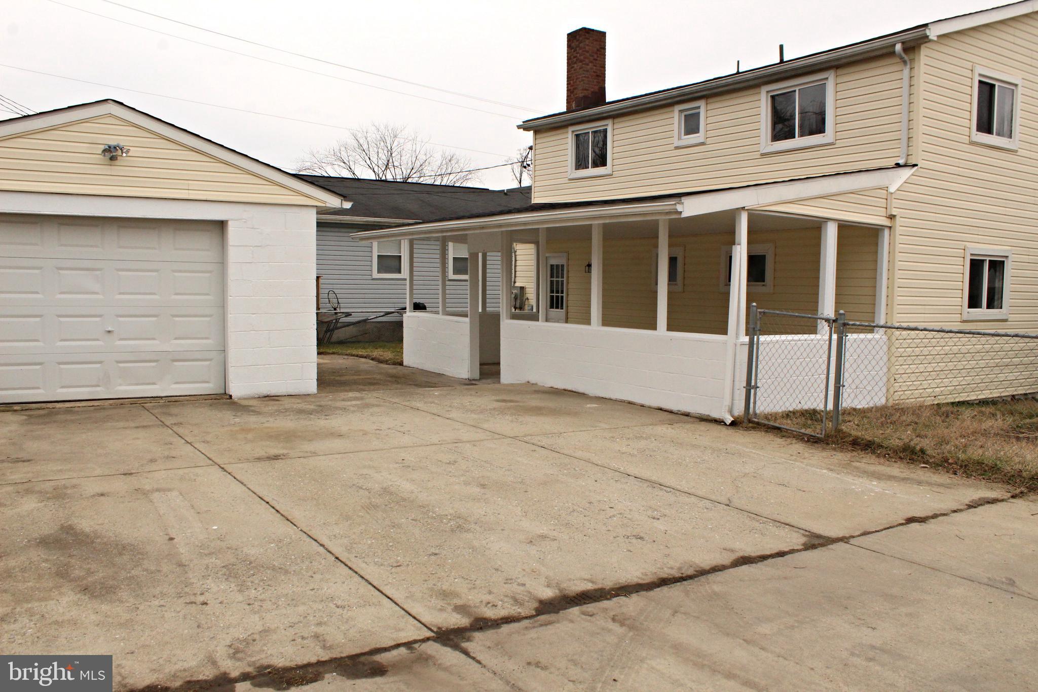 545 Compass Road East Baltimore, MD 21220 - Photo 29 of 30 a view of a house with a backyard