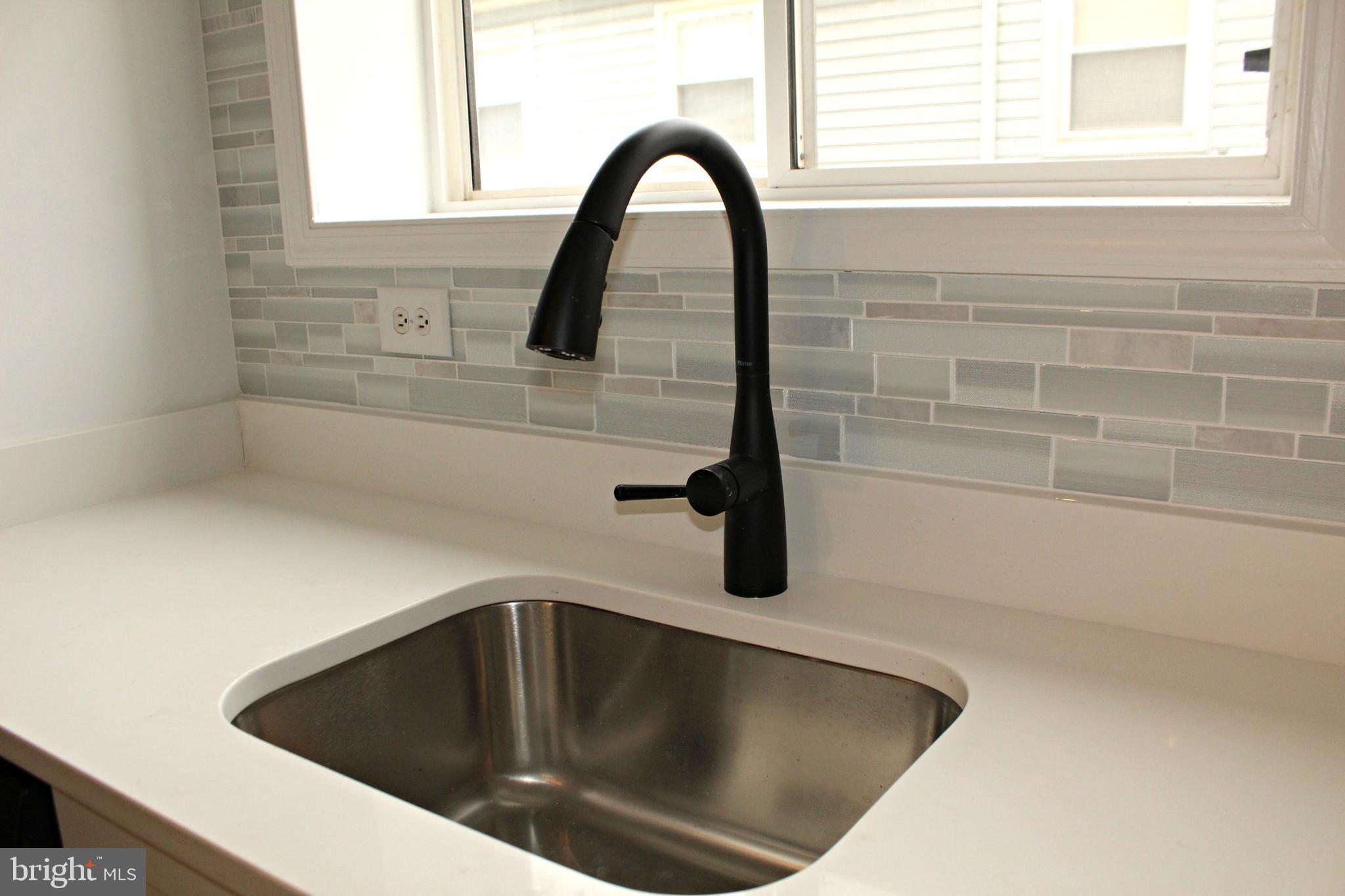 545 Compass Road East Baltimore, MD 21220 - Photo 7 of 30 a close view of sink and tap