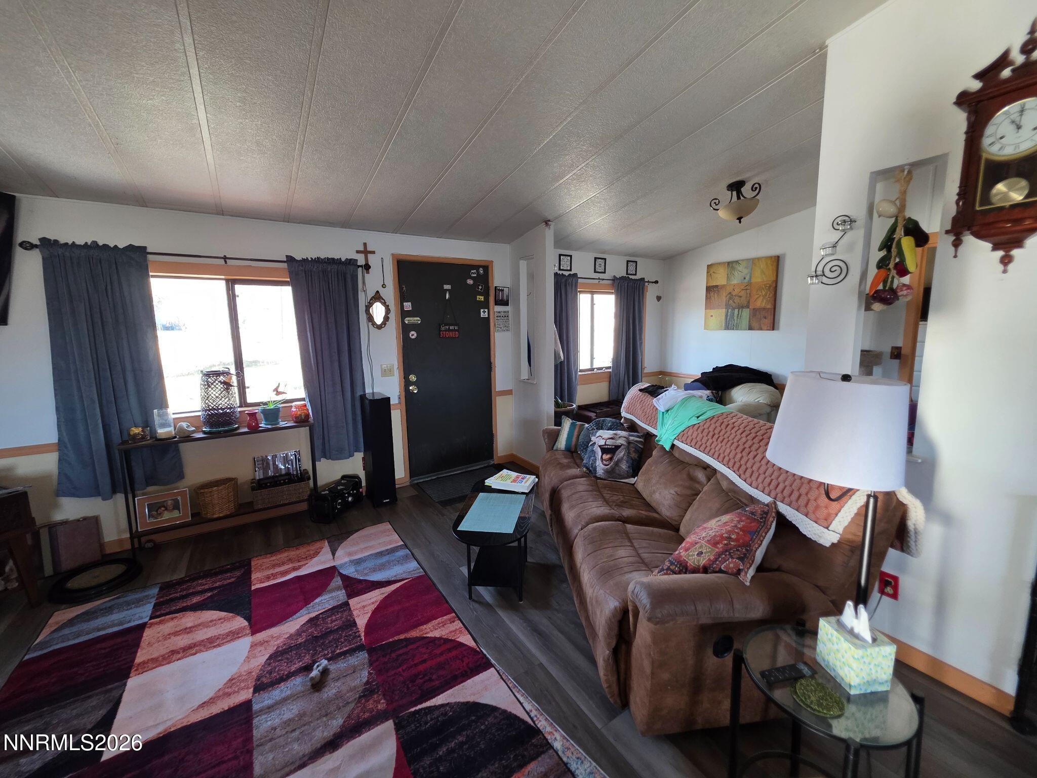 3985 Granite Way Topaz Ranch Estates, NV 89444 - Photo 22 of 34 a living room with furniture rug and window