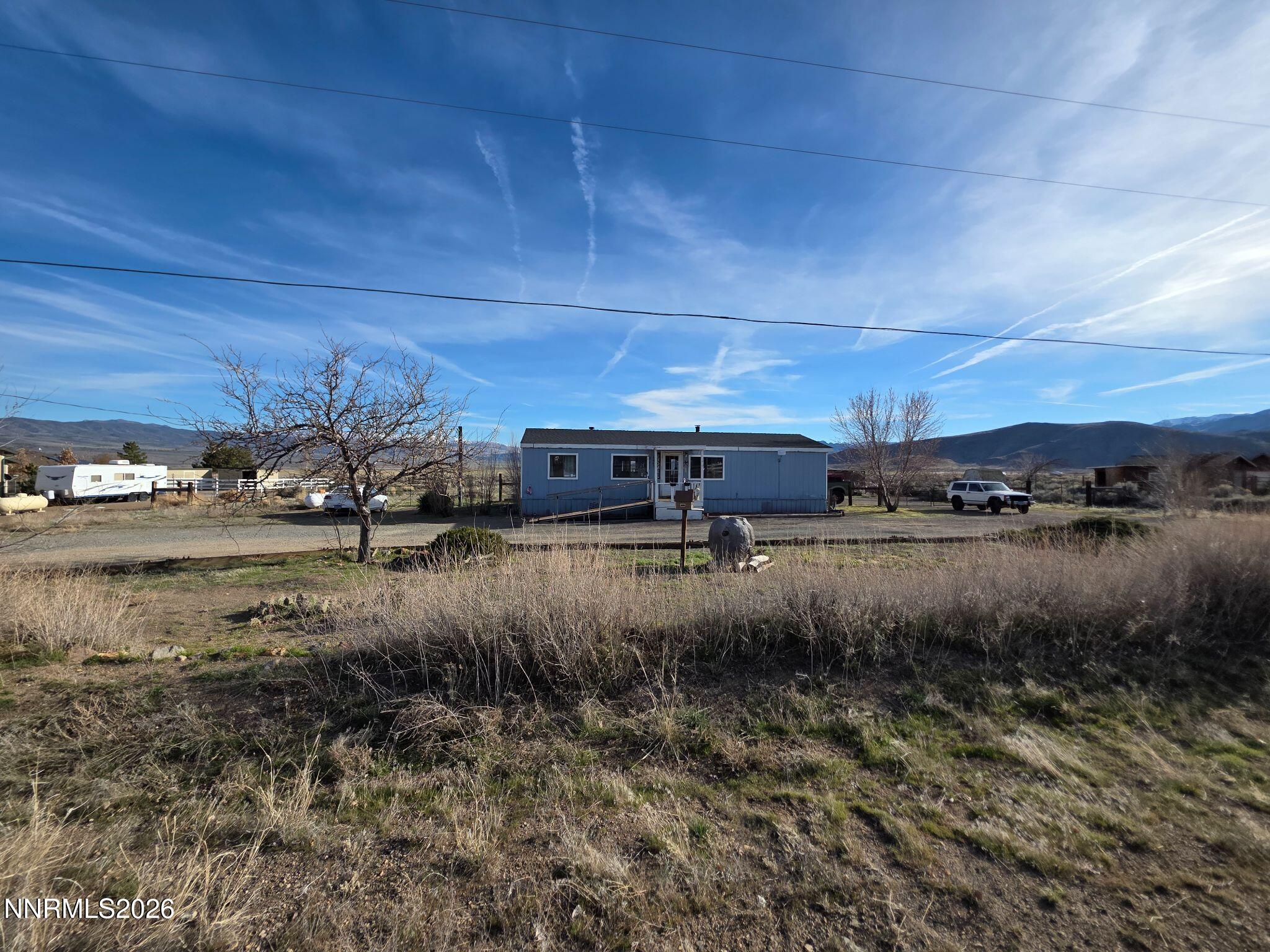 3985 Granite Way Topaz Ranch Estates, NV 89444 - Photo 3 of 34 a view of a town with big trees