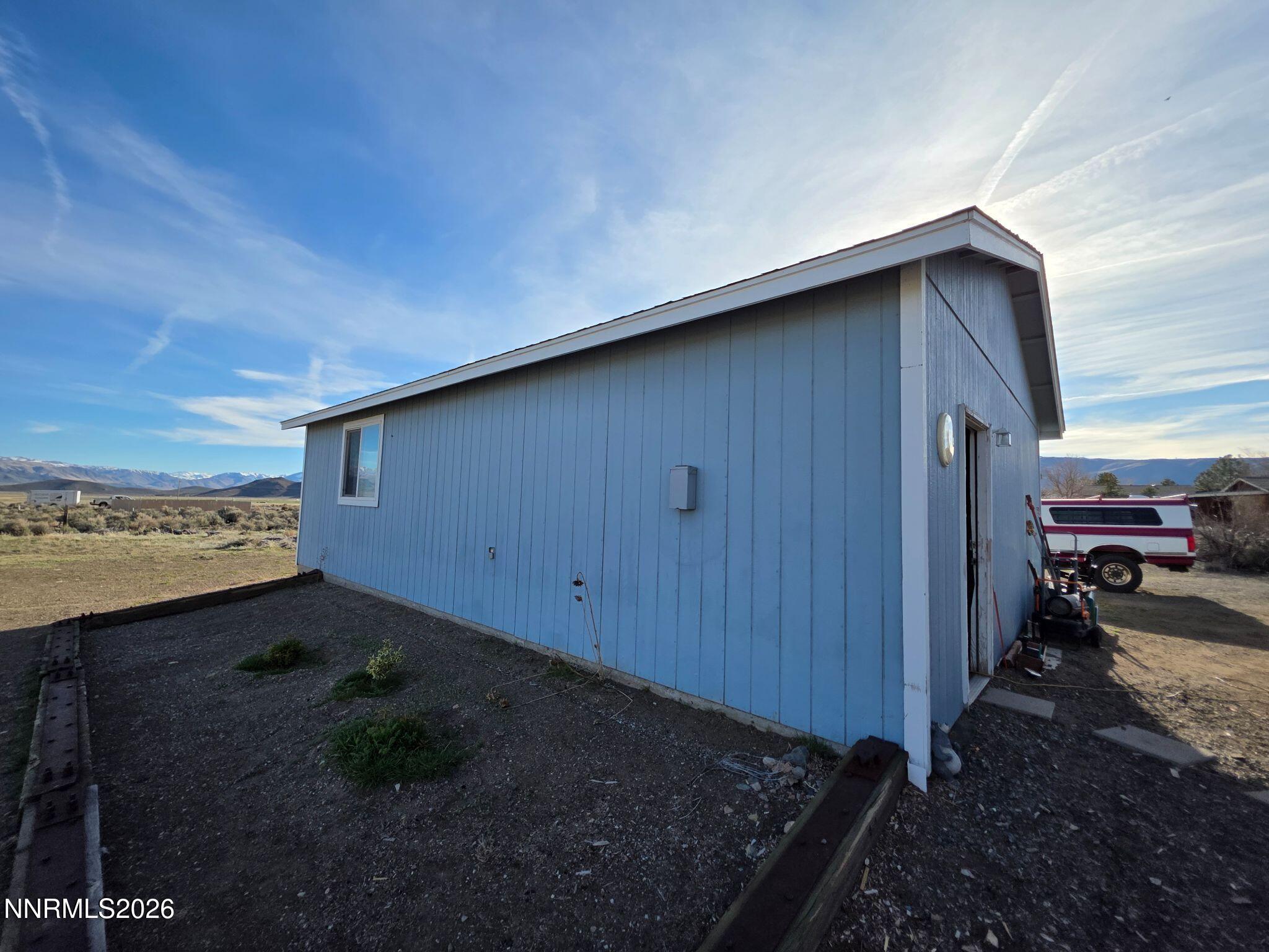 3985 Granite Way Topaz Ranch Estates, NV 89444 - Photo 8 of 34 a view of a backyard of a house