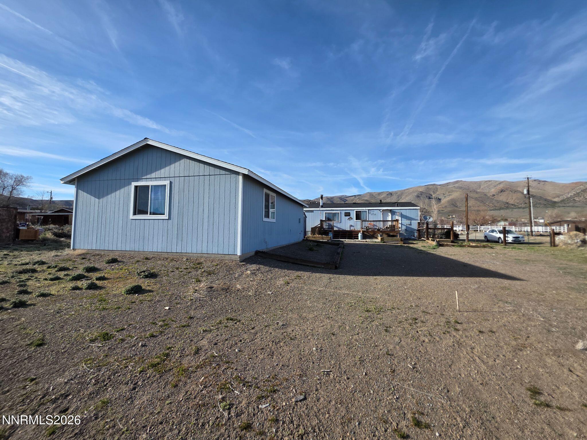 3985 Granite Way Topaz Ranch Estates, NV 89444 - Photo 10 of 34 a view of house with a yard