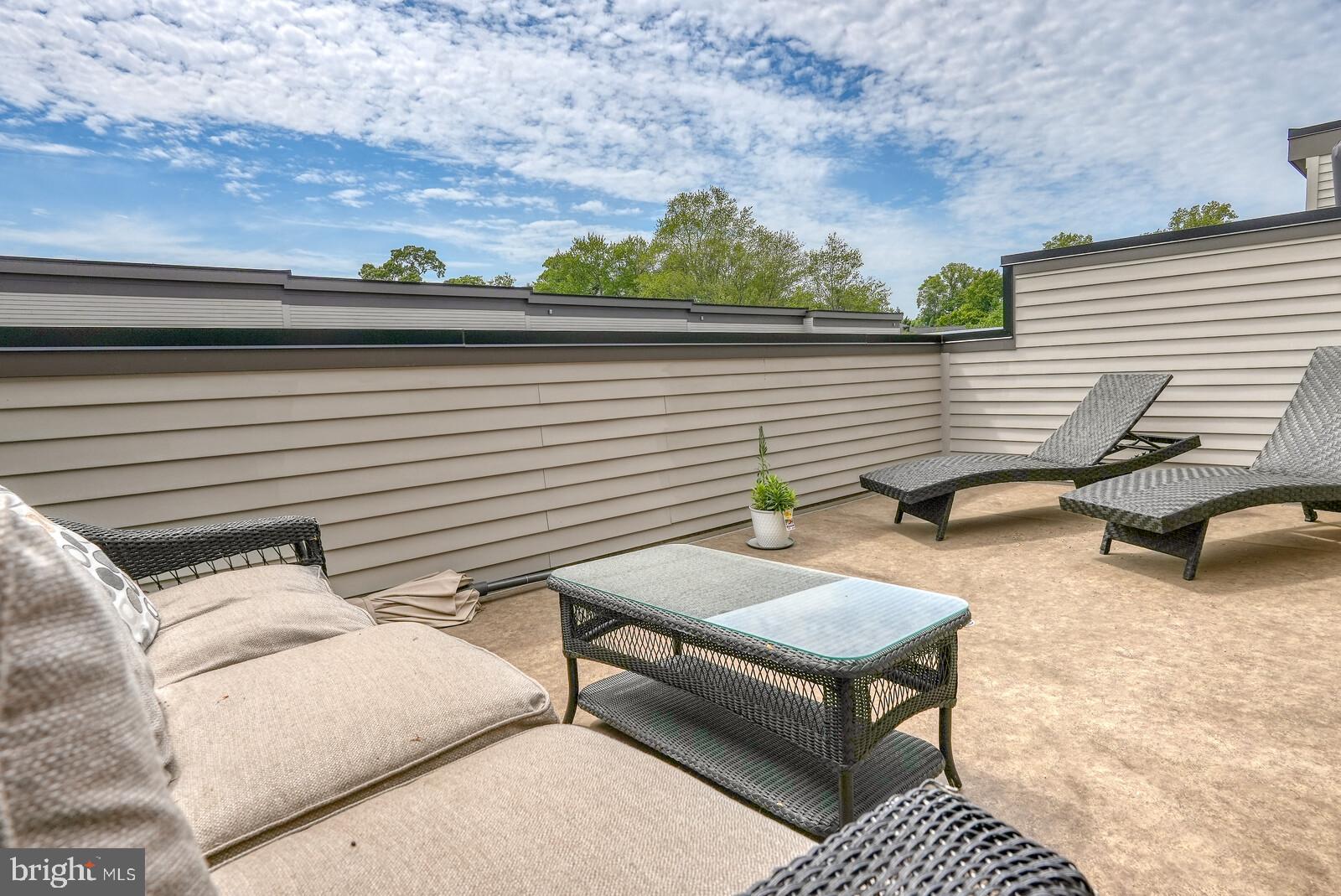 5345 Zenith Overlook Bethesda, MD 20816 - Photo 51 of 53 a backyard of a house with outdoor seating
