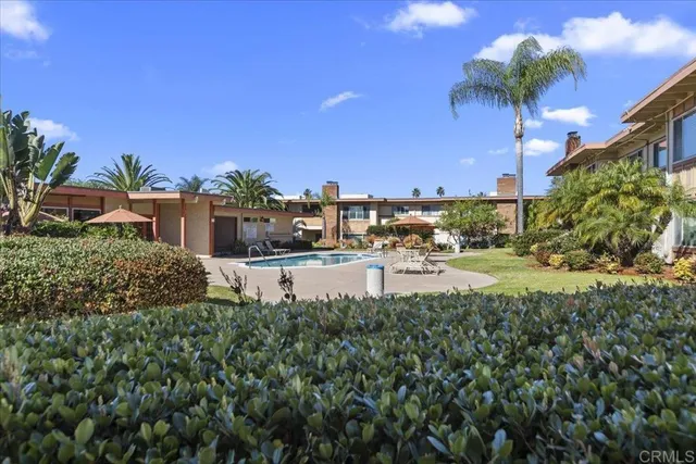 a view of a lake with a building in the background