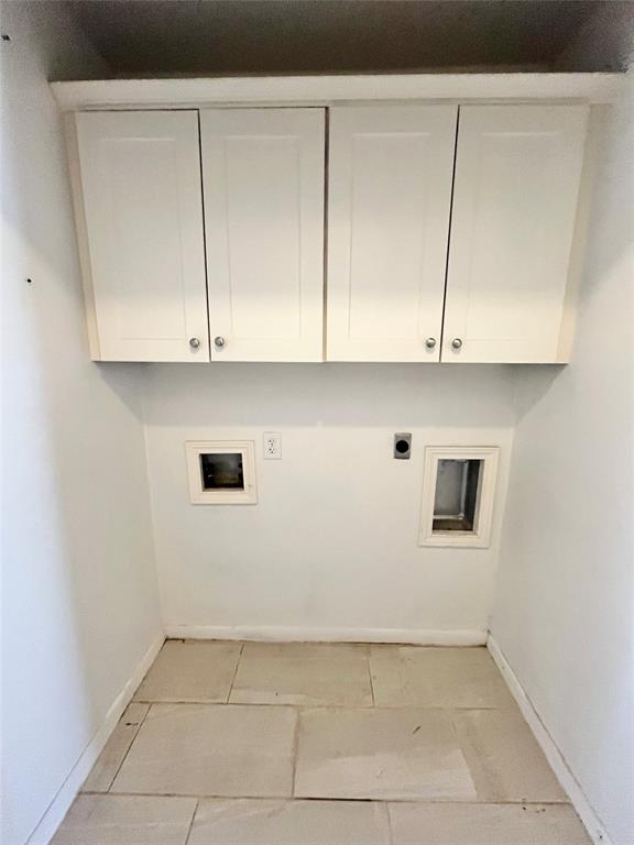 2427 January Lane Grand Prairie, TX 75050 - Photo 12 of 14 a view of kitchen with white cabinets