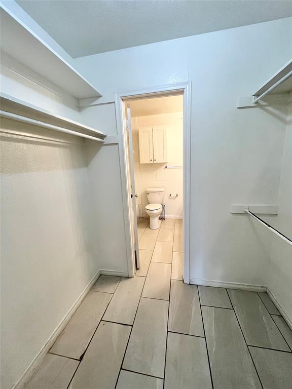 2427 January Lane Grand Prairie, TX 75050 - Photo 8 of 14 a view of a storage & utility room with a sink