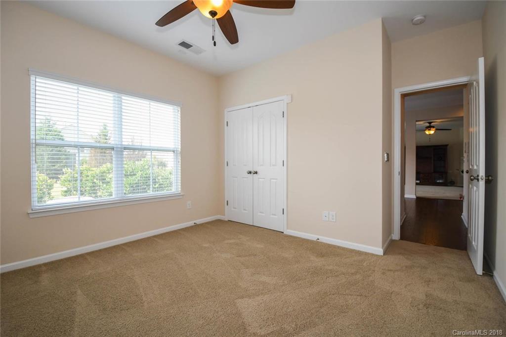 1700 Ridgehaven Road Waxhaw, NC 28173 - Photo 14 of 27 a view of an empty room with a window