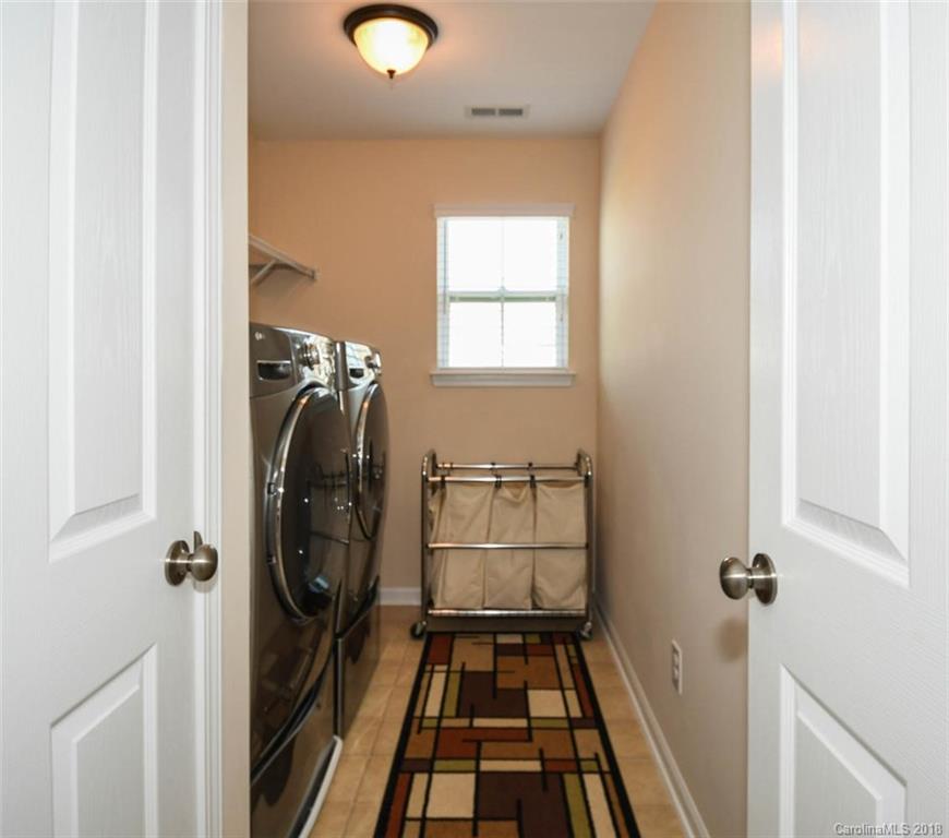 1700 Ridgehaven Road Waxhaw, NC 28173 - Photo 23 of 27 a view of a storage & utility room with a sink