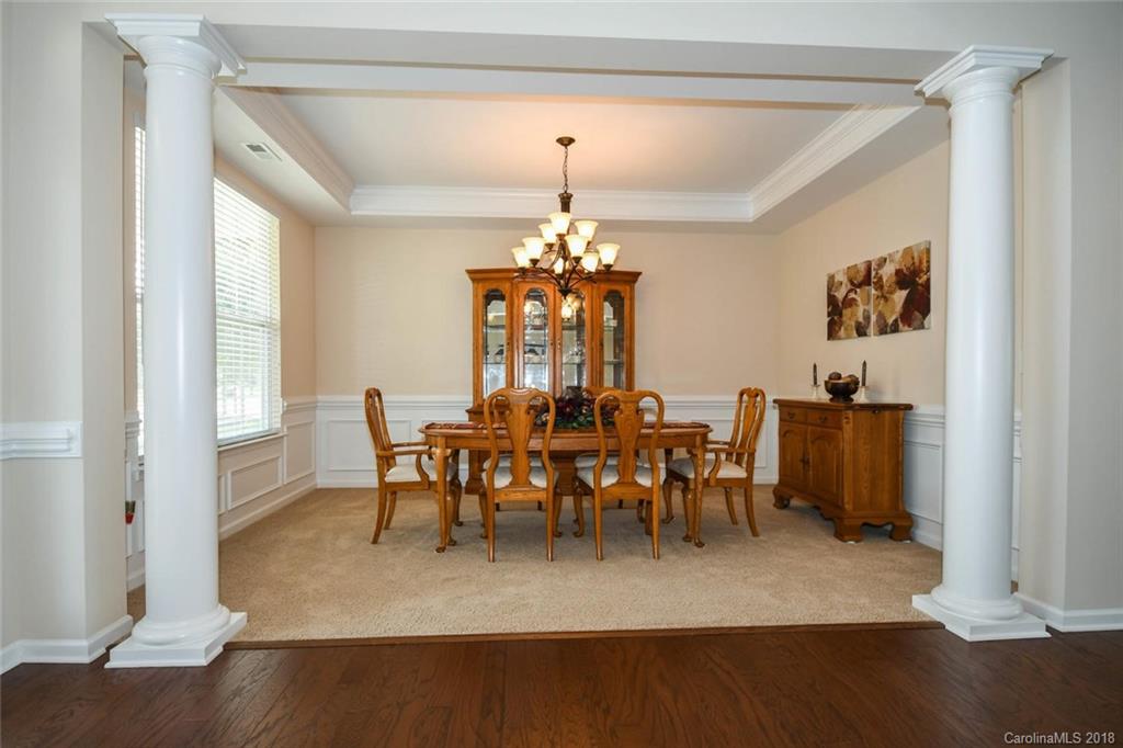 1700 Ridgehaven Road Waxhaw, NC 28173 - Photo 7 of 27 a view of a dining room with furniture window and wooden floor