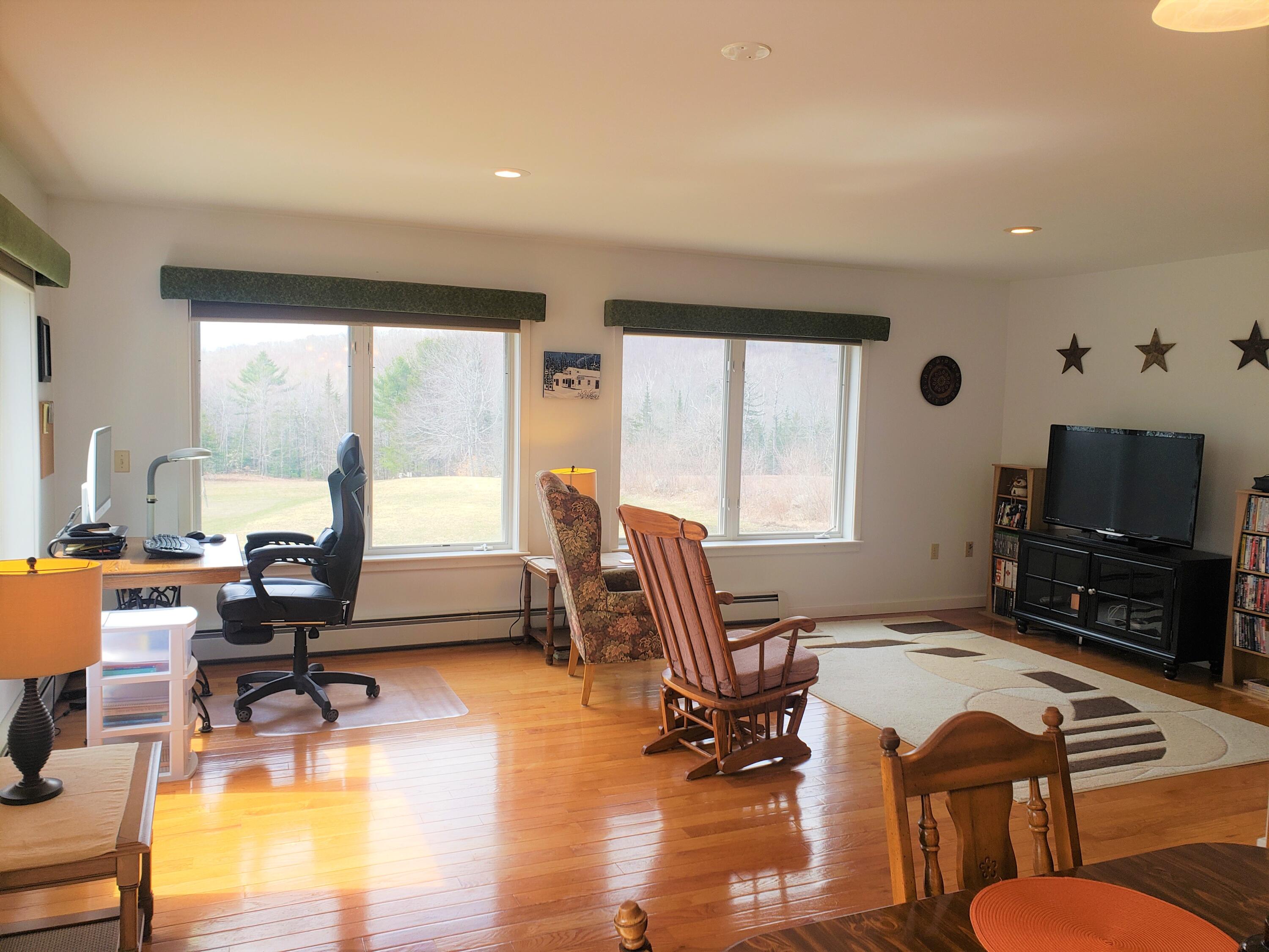 39 Winkumpaugh Road Orland, ME 04472 - Photo 16 of 57 Dining area to living room