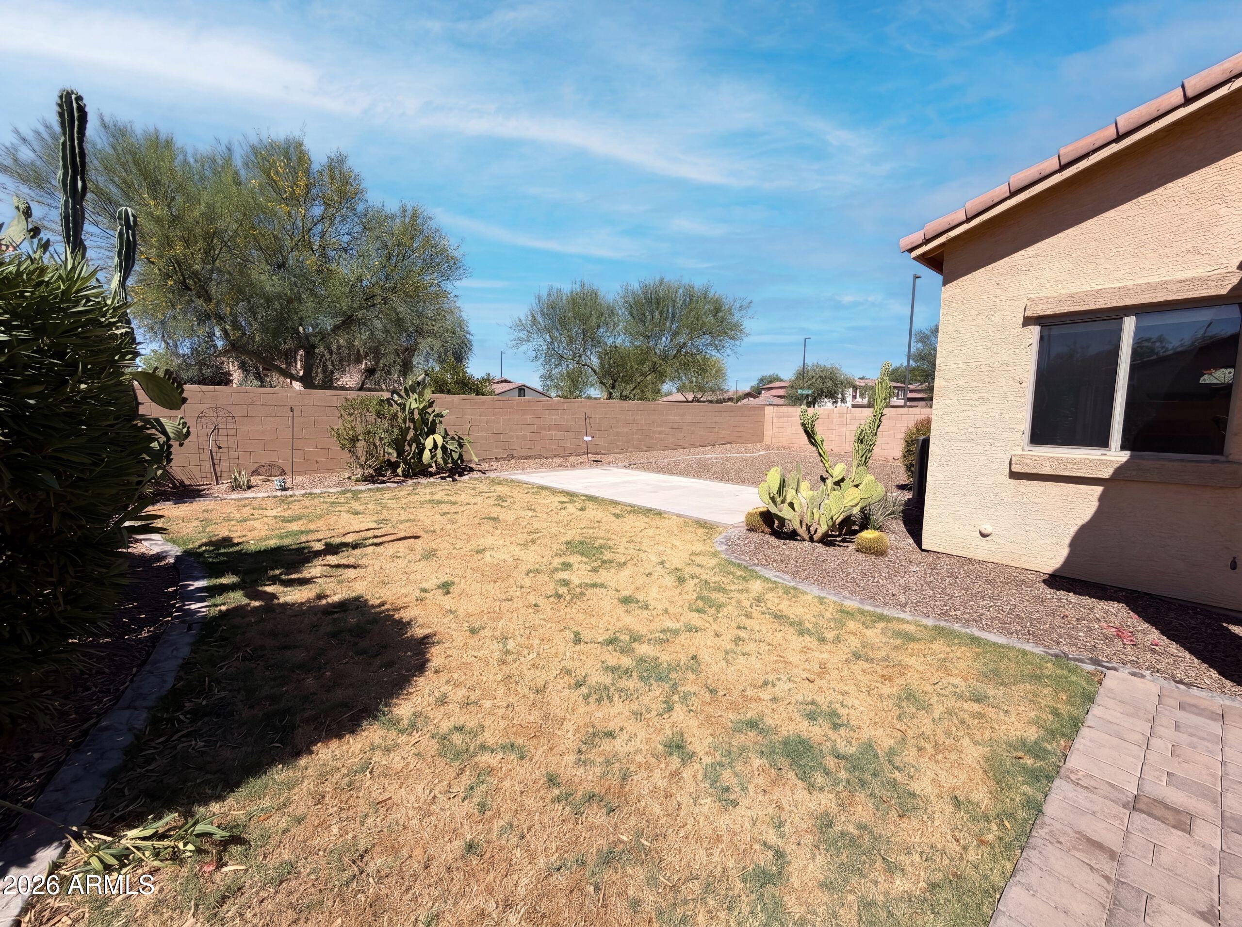 3951 East Timberline Road Gilbert, AZ 85297 - Photo 27 of 28 a view of a backyard of the house