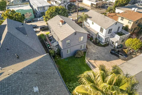 an aerial view of a house with a garden
