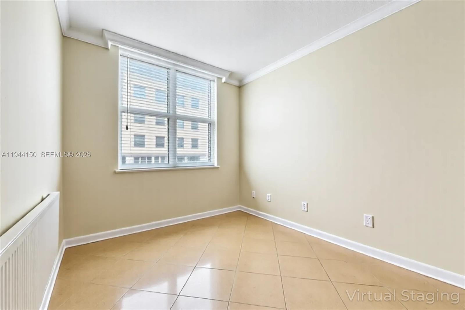 2030 Douglas Road, Unit 511 Coral Gables, FL 33134 - Photo 12 of 19 a view of a room with a large window