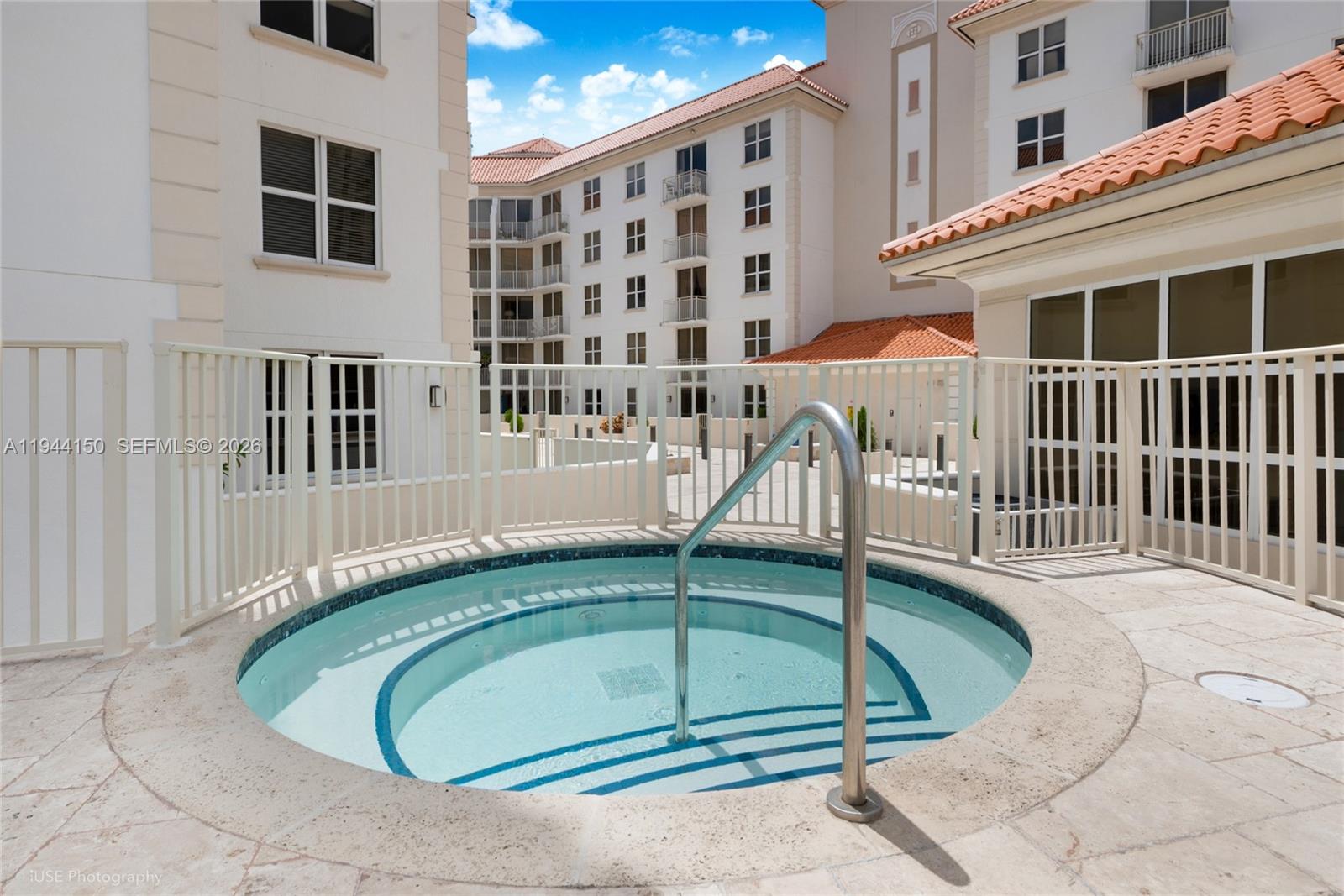 2030 Douglas Road, Unit 511 Coral Gables, FL 33134 - Photo 14 of 19 a view of a balcony with a swimming pool