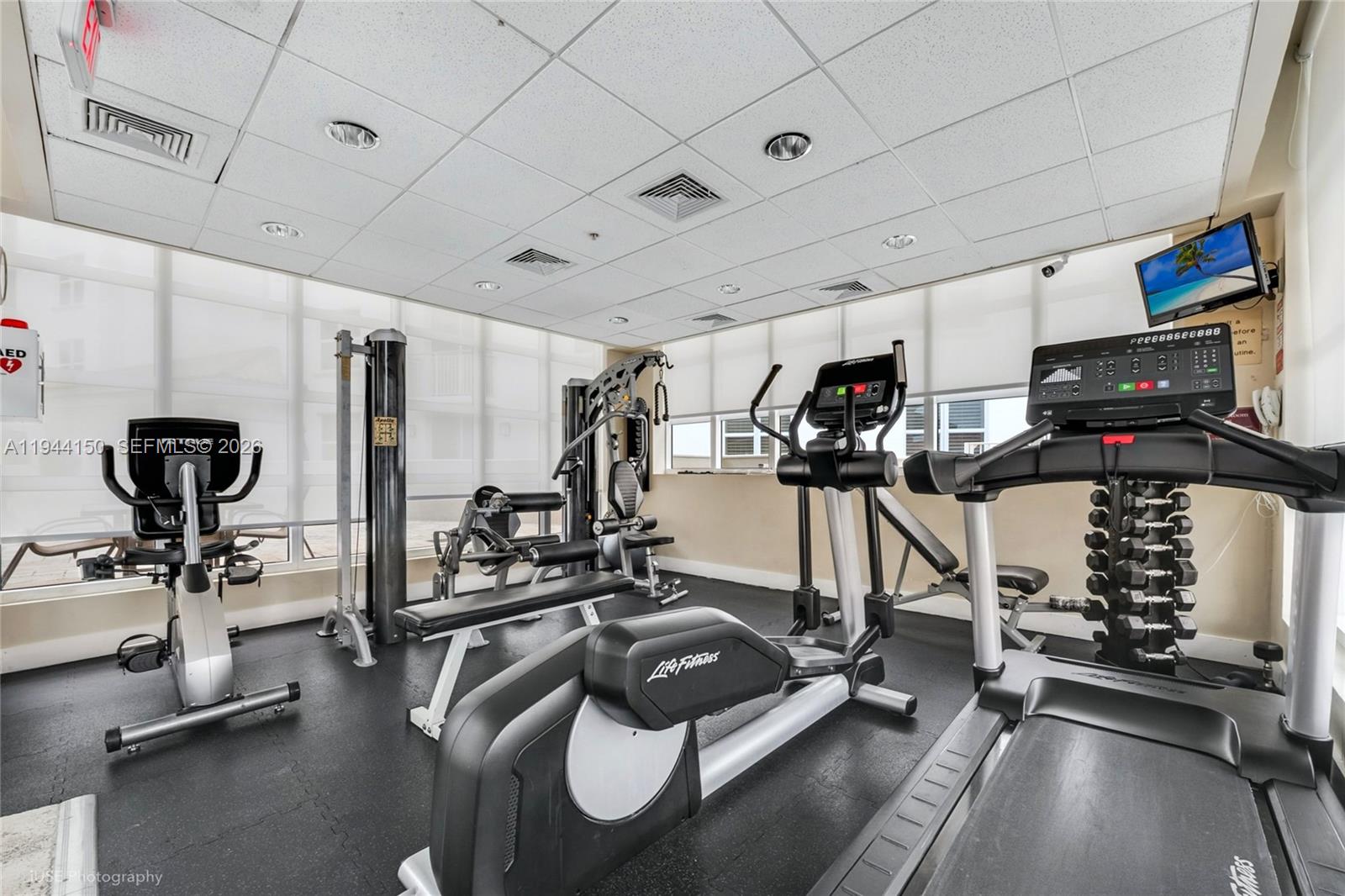 2030 Douglas Road, Unit 511 Coral Gables, FL 33134 - Photo 15 of 19 a view of a room with gym equipment