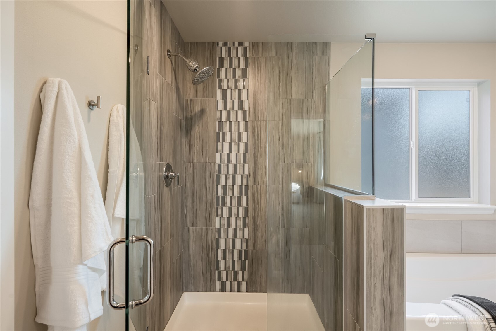 28931 239th Avenue Southeast Maple Valley, WA 98010 - Photo 18 of 37 a bathroom with a shower