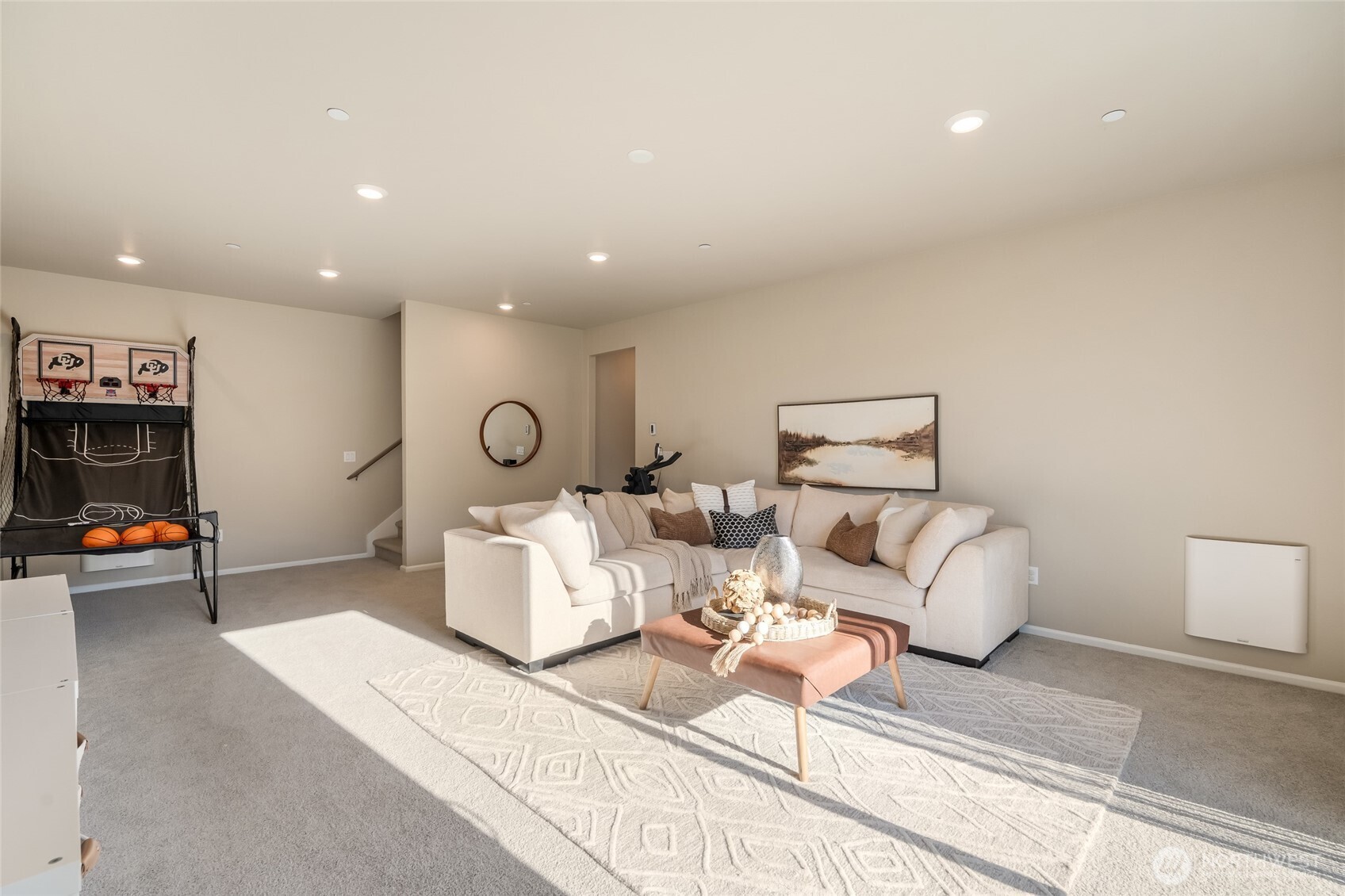 28931 239th Avenue Southeast Maple Valley, WA 98010 - Photo 24 of 37 a living room with furniture and a mirror