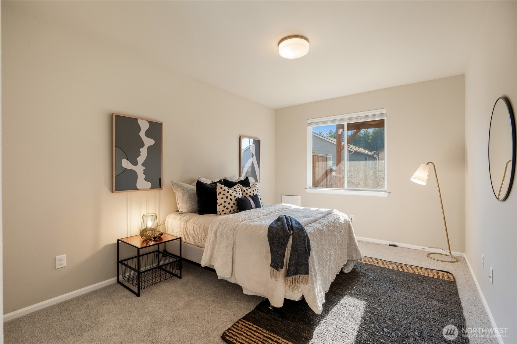 28931 239th Avenue Southeast Maple Valley, WA 98010 - Photo 25 of 37 a bedroom with a bed and wooden floor