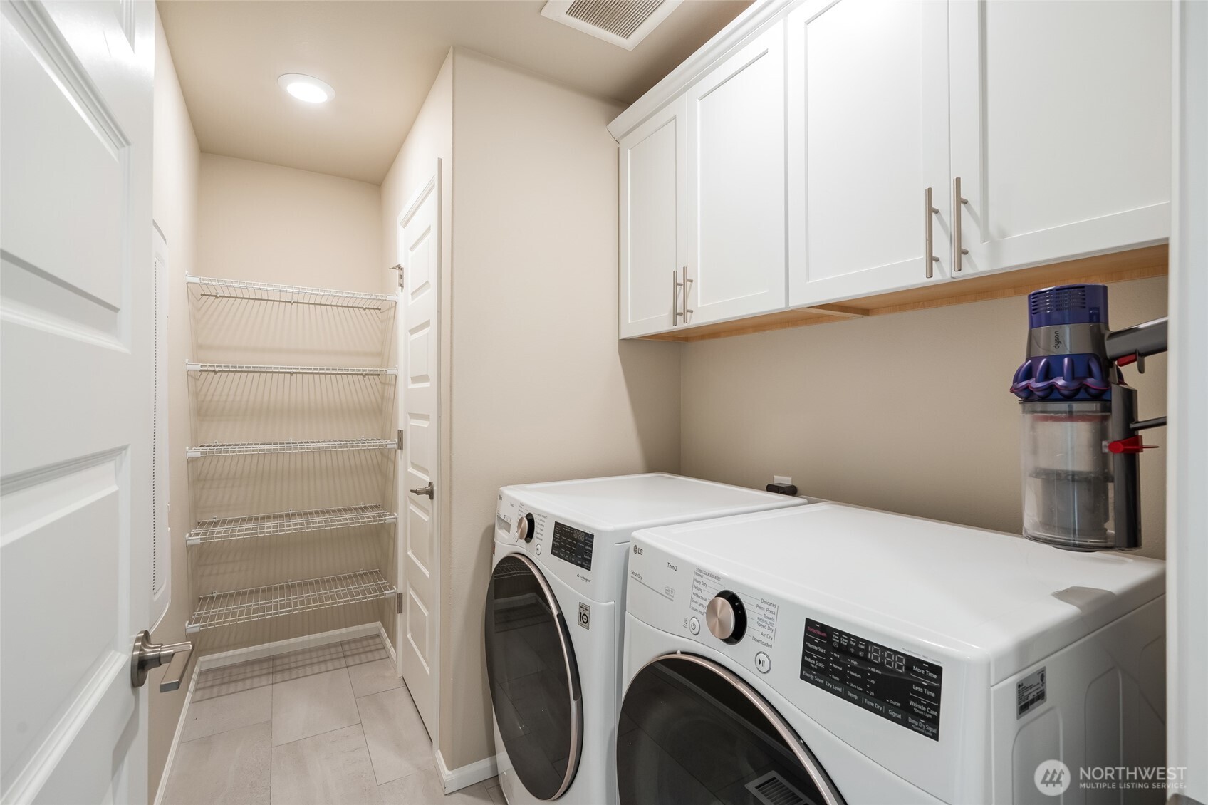 28931 239th Avenue Southeast Maple Valley, WA 98010 - Photo 27 of 37 a utility room with dryer and washer
