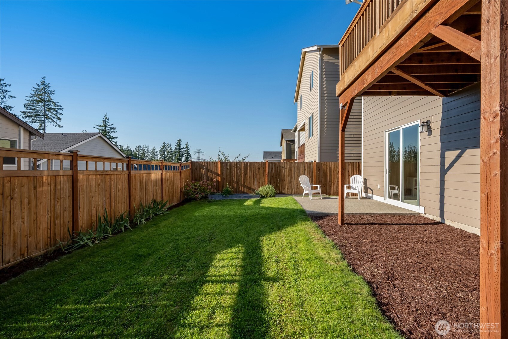 28931 239th Avenue Southeast Maple Valley, WA 98010 - Photo 29 of 37 a view of a house with backyard and porch