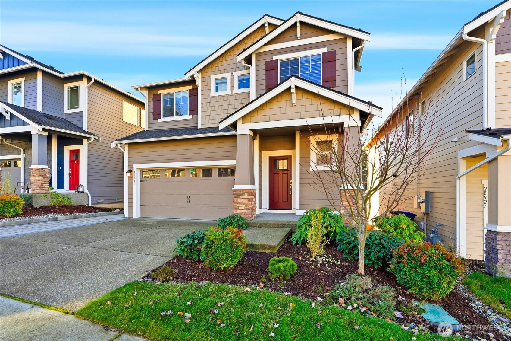 28931 239th Avenue Southeast Maple Valley, WA 98010 - Photo 36 of 37 a front view of a house with garden