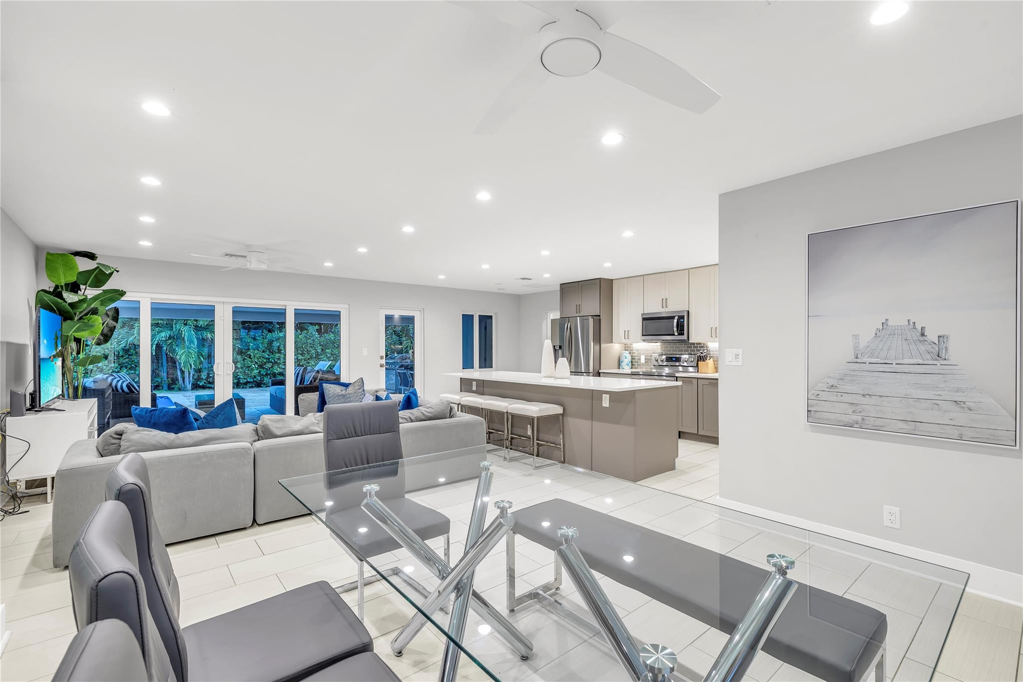2120 Northeast 34th Court Lighthouse Point, FL 33064 - Photo 12 of 34 a living room with furniture and a large window