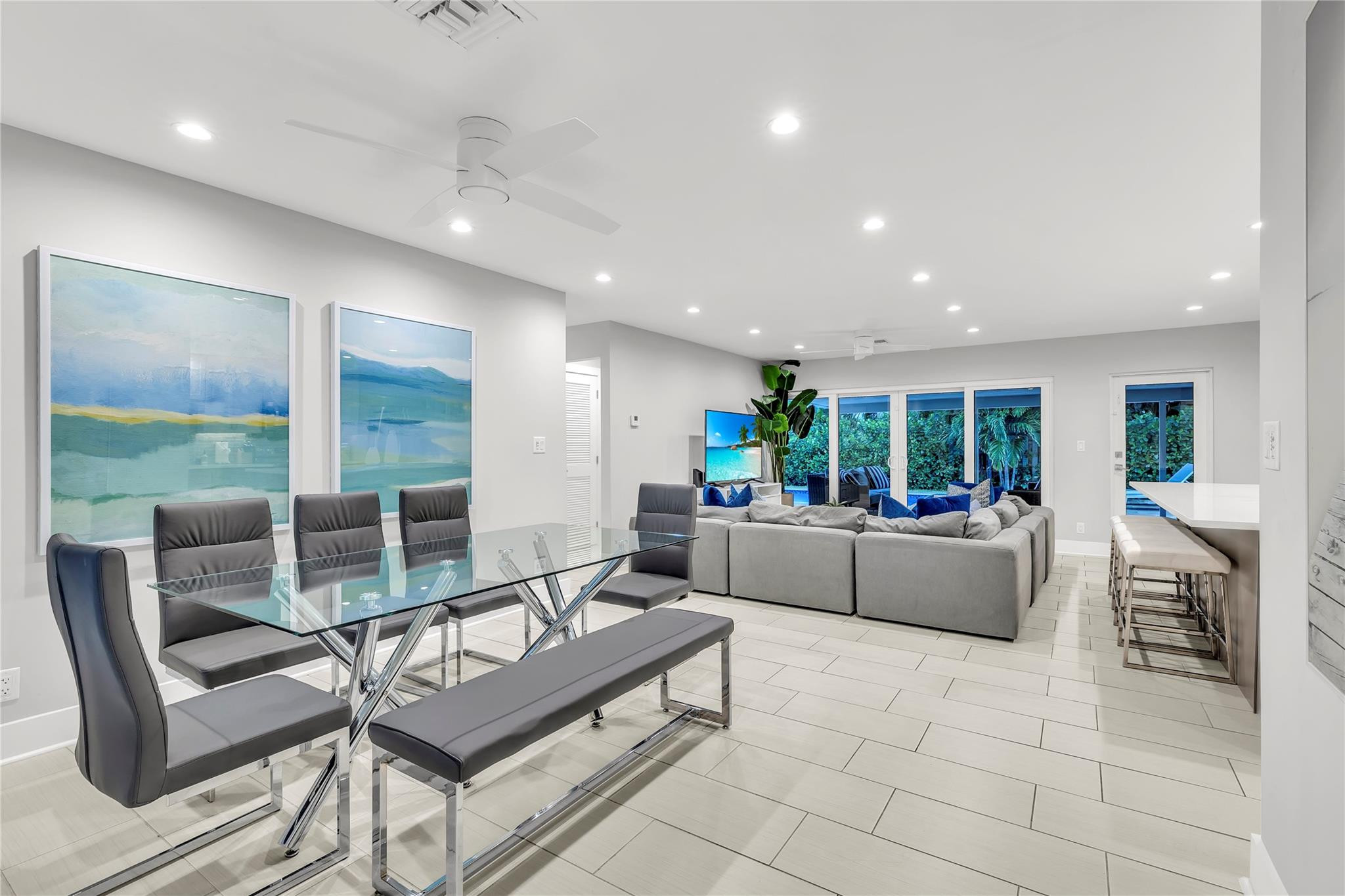 2120 Northeast 34th Court Lighthouse Point, FL 33064 - Photo 14 of 34 a living room with furniture and a table