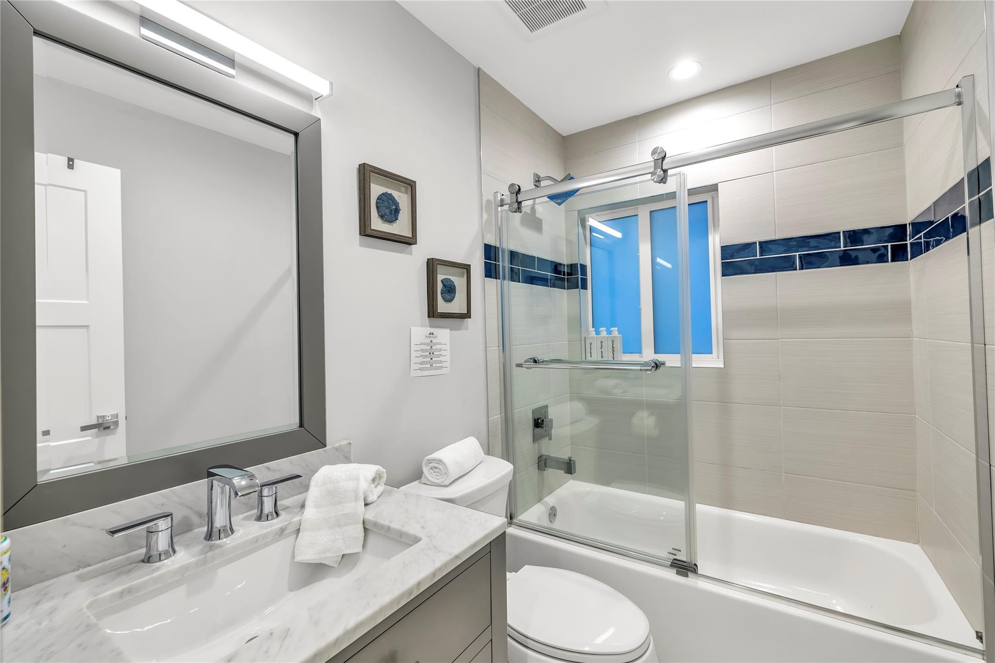 2120 Northeast 34th Court Lighthouse Point, FL 33064 - Photo 22 of 34 a bathroom with a granite countertop sink toilet and shower